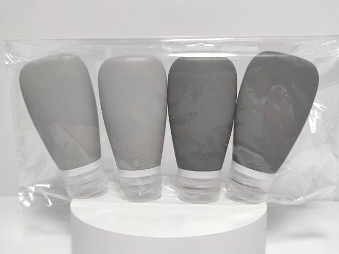 LYOB Travel Bottles for Toiletries, TSA Approved 3oz Leak Proof Silicone Soft Refillable Squeeze Travel Size Containers BPA Free for Cleansers, Lotions, Shampoo, Conditioner 4pk (2Black-2Gray)
