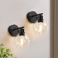 Set of 2 Black Modern Bathroom Wall Sconces, Clear Glass Vanity Lights with E26 Socket, Up & Down Reversible Bathroom Light Fixtures for Mirror, Bedroom, Hallway, Living Room