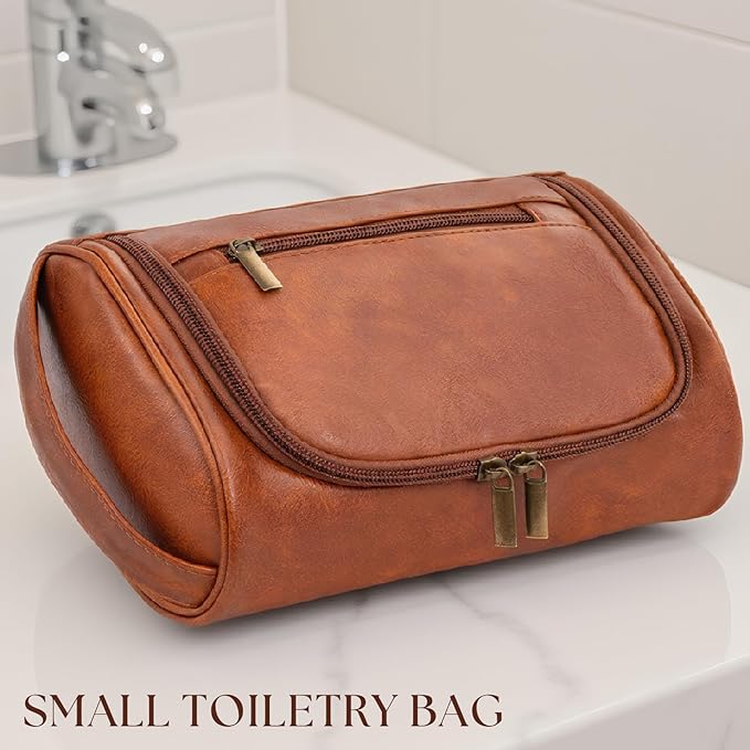 Mens Toiletry Bag, Compact Dopp Kit for Men Travel, PU Leather Shaving Kit, Water-Resistant Minimalist Organizer with Wrist Strap, Fits Grooming Essentials,Small 9X5.9X3 Inch Brown