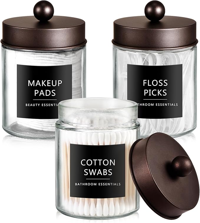 SheeChung Qtip Holder Dispenser for Bathroom Vanity Organizer and Farmhouse Decor - Stylish Glass Apothecary Jar with Stainless Steel Lid and Sticker,Bathroom Countertop Storage Canister(Bronze,3Pack)