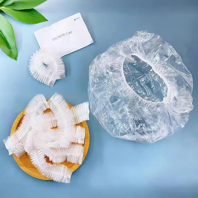 100PCS Disposable Shower Caps, Plastic Clear Hair Cap Large Thick Waterproof Bath Caps for Women & Men Unisex Reusable Travel Essentials for Deep Conditioning, Hair Treatment, Hotel, Spa, and Home Use
