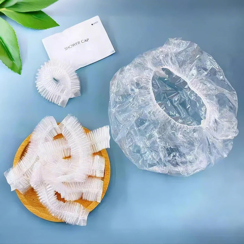 100PCS Disposable Shower Caps, Plastic Clear Hair Cap Large Thick Waterproof Bath Caps for Women & Men Unisex Reusable Travel Essentials for Deep Conditioning, Hair Treatment, Hotel, Spa, and Home Use